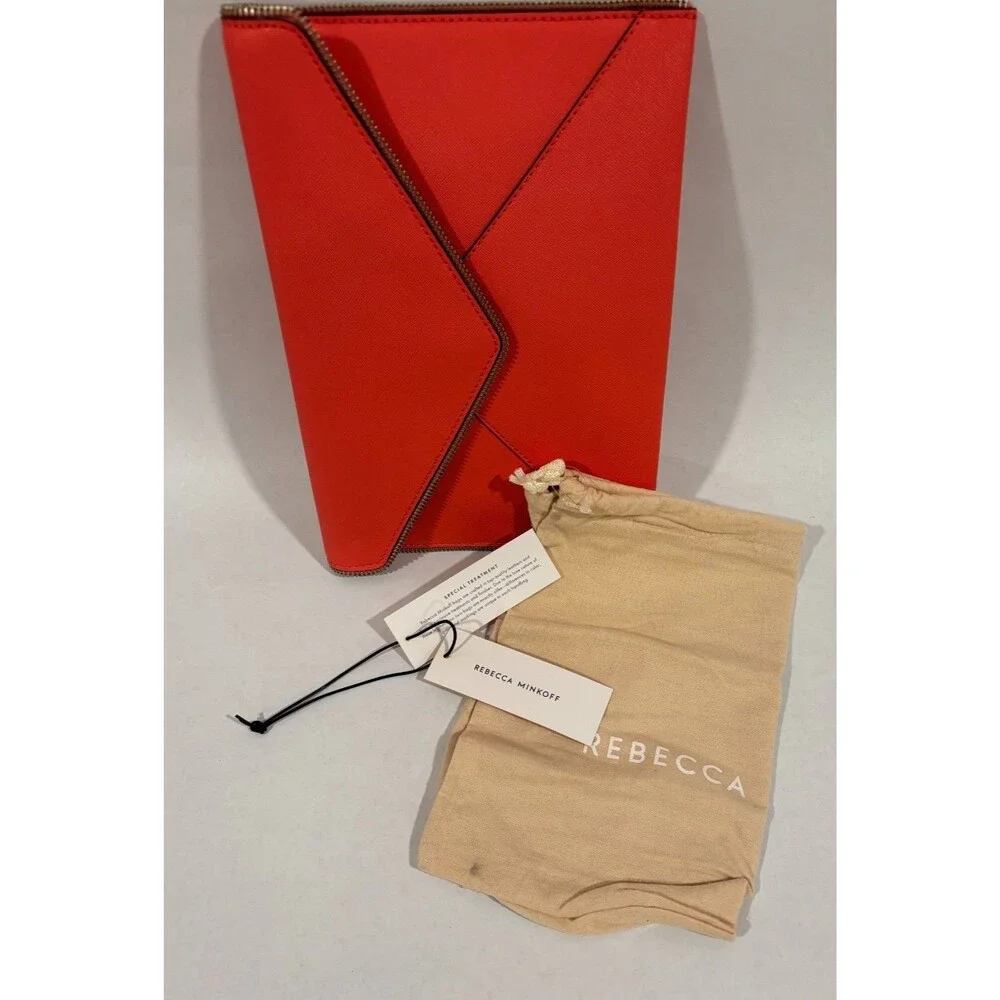 Rebecca Minkoff LEO envelope clutch leather color grapefruit zipper edge